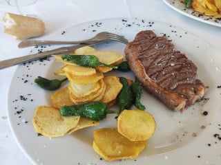 Casa Manu Nucía · Carnes · Arrocería · Pescados